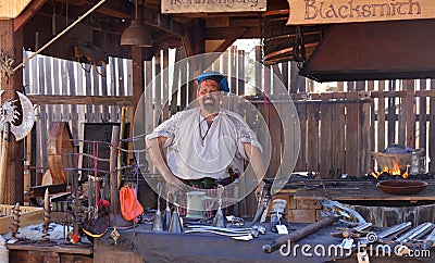 A Blacksmith Dressed in Traditional Outfit Editorial Stock Photo