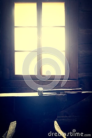 Blacksmith`s hammer on the anvil Stock Photo