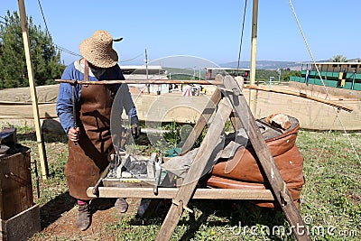 Blacksmith`s work and blacksmith`s tools Editorial Stock Photo