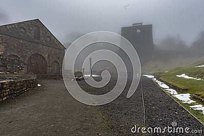 Blaenavon Ironworks, in the South Wales Valleys, with the old, industrial buildings cloaked in fog Stock Photo