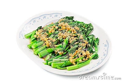Blanched Chinese Choy Sum vegetable with garlic oil dish Stock Photo