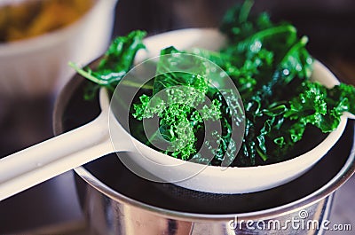 Blanching kale Stock Photo