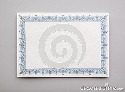 Blank achievement certificate document template with an ornate border Stock Photo