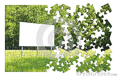 Blank advertising billboard immersed in a rural scene - concept image in jigsaw puzzle shape Stock Photo