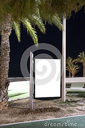 Blank billboard outdoors, outdoor advertising, public information place holder board advertising stand at the seaside Stock Photo