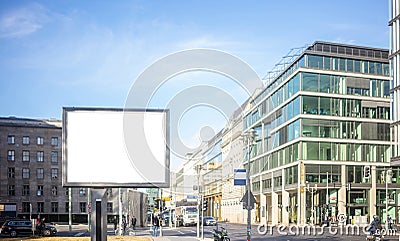 Empty billboard for public advertisement on the roadside. Space for text. People and city background Stock Photo