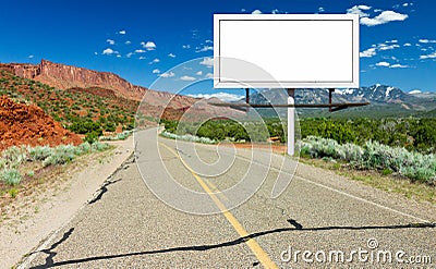 Blank Billboard Sign by Highway in Desert Stock Photo