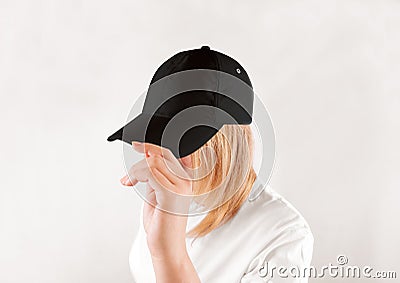 Blank black baseball cap mockup template, wear on women head Stock Photo