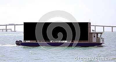 Blank black boat sign over water in ocean and bridge background south Florida Miami Beach Stock Photo