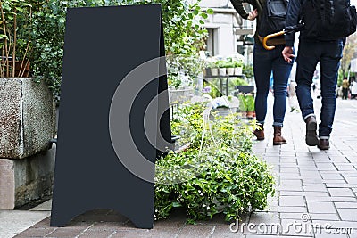 Blank Board stand mock up Black metal Signage Outdoor Stock Photo