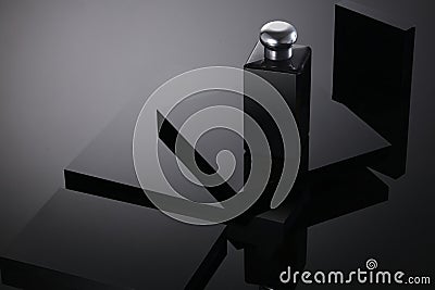 Blank Bottle Cosmetics on crystal black square podium background Stock Photo