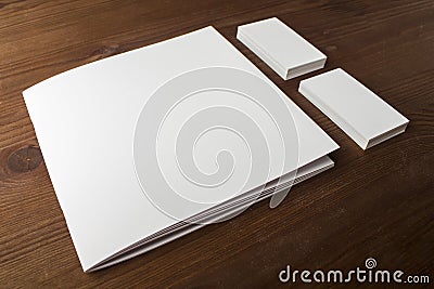 Blank business cards and booklet, brochure on a wooden background. For your design. Stock Photo