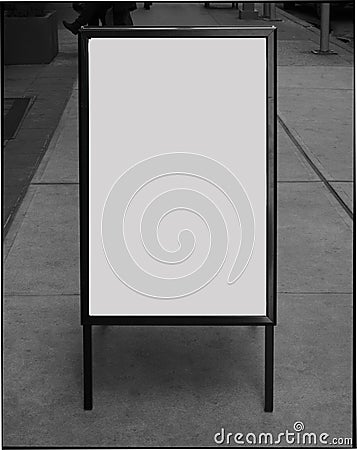 Blank business sign on sidewalk Stock Photo