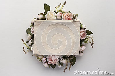 Blank canvas makeup zip bag on a floral wreath mockup Stock Photo