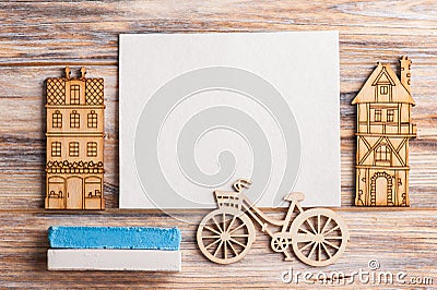 Blank card, wooden houses and bike Stock Photo