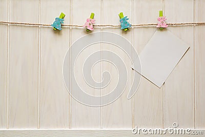 Blank cards clipped to clothespins Stock Photo