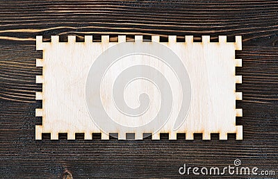 Blank carved frame on vintage wood background. Stock Photo