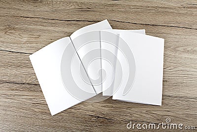 Blank catalog, brochure, magazines, book on wooden background Stock Photo