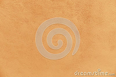 Blank cement plaster wall orange colour. concrete wall texture for background Stock Photo