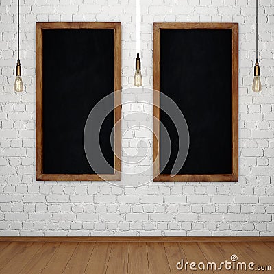 Blank chalkboard on white brick wall with glowing light bulbs Stock Photo