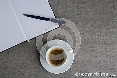 booklet, pencil and coffee cup Stock Photo