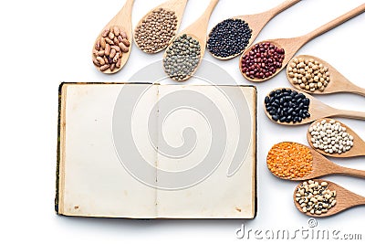 Blank cookbook and various legumes Stock Photo