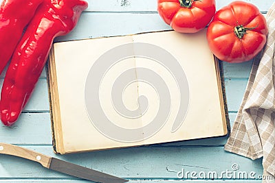 Blank cookbook and vegetable Stock Photo