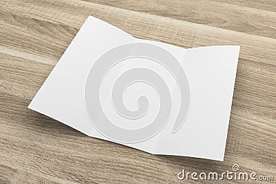 Blank 3D rendering tri-fold brochure mock-up with clipping path on wood No. 4 Stock Photo