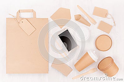 Blank different cardboard packaging for fast food - bag, coffee cup, screen phone, cutlery, sugar, spice, container and box. Stock Photo