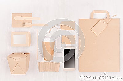 Blank different cardboard packaging for fast food - coffee cup, screen phone, cutlery, sugar, spice, container and box for sushi. Stock Photo