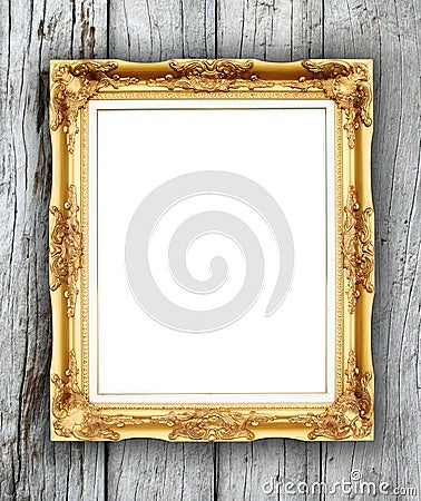 Blank golden frame on wood wall Stock Photo