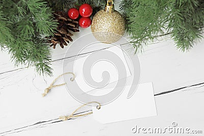 2 blank hang tag mockup with classic christmas border on white wood table Stock Photo