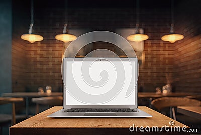 Blank laptop on the coffe shop table Stock Photo