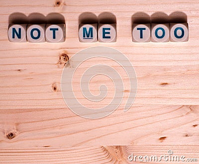 Blank light colored wood fills this template image with the word Not Me Too spelled out in blocks along the top Stock Photo