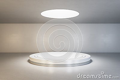 Blank light round illuminated from top podium in empty loft style hall with concrete floor and walls. Mockup Stock Photo