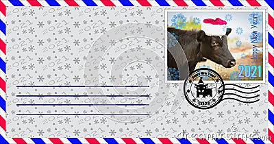 Blank mailing envelope with a stamp depicting a bull wearing a Santa Claus hat. Content for the designer Stock Photo