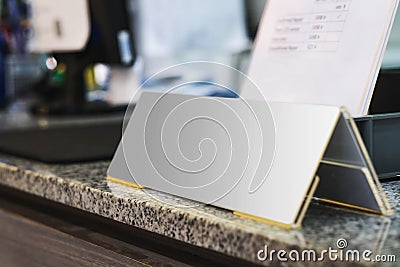 Blank name plate on desk in office Stock Photo