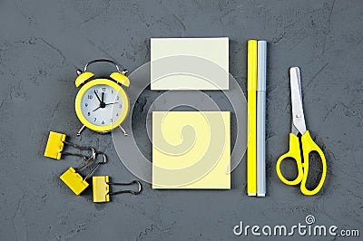 Blank note with clock on gray background Stock Photo