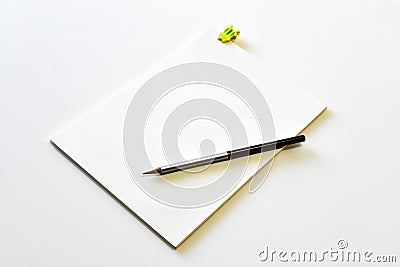 Blank notebook with yellow clipboard and pencil Stock Photo