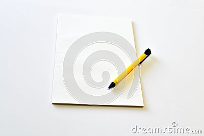 Blank notebook with yellow pen Stock Photo