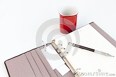 Blank page diary pencil and red cup of coffee Stock Photo