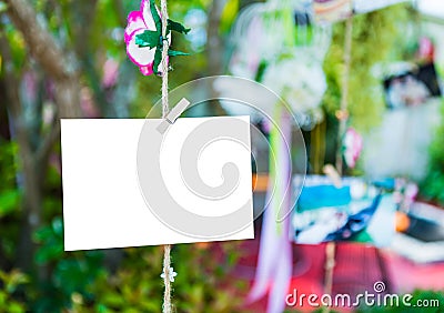 Blank paper hanging on tree Stock Photo