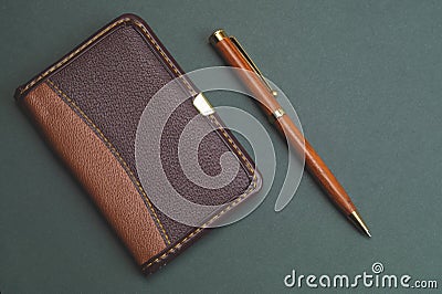 Blank paper of notepad with wooden pen. office supplies. diary with leather cover Stock Photo