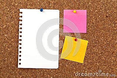 Blank paper pinned to a notice board Stock Photo