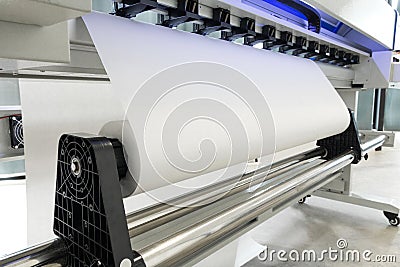 Blank paper roll in large printer format inkjet machine for industrial business Stock Photo