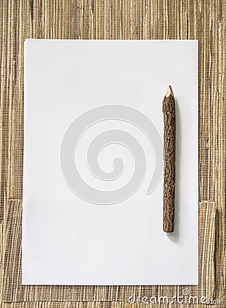 Blank Paper and wood Pencil on nature background Stock Photo