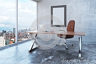 Blank picture frame in loft office with city view, modern furniture and concrete wall and floor, mock up Stock Photo