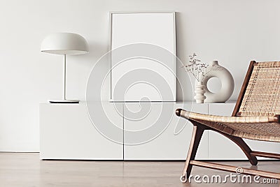 Blank picture frame mockup on white wall. White living room design. View of modern scandinavian style interior Stock Photo