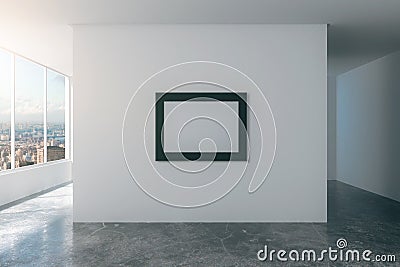 Blank picture frame on white wall in empty loft style room Stock Photo