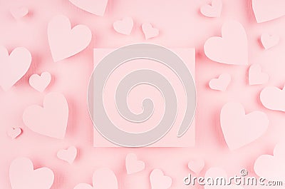 Blank pink square page with paper hearts on light background. Advertising concept for Valentine day. Stock Photo
